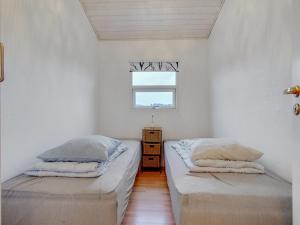 Ένα ή περισσότερα κρεβάτια σε δωμάτιο στο Holiday Home Clarissa - 300m from the sea by Interhome +10 φωτογραφίες