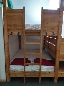 a pair of bunk beds in a room at gite des Hauts Plateaux in Corrençon-en-Vercors