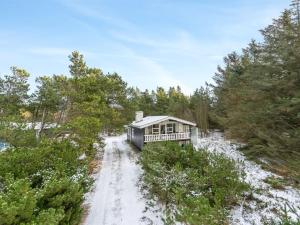 a small house in the middle of a dirt road at Holiday Home Freda - 100m to the inlet by Interhome in Løgsted +25 photos