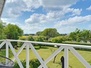 a view from the balcony of a house at Holiday Home Tamer - 500m to the fjord by Interhome in Farsø