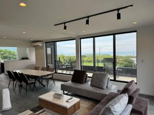 a living room with a couch and a table at Awaji - House - Vacation STAY 19734 in Awaji