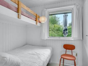 Ένα ή περισσότερα κρεβάτια σε δωμάτιο στο Holiday Home Jarno - 1km from the sea by Interhome