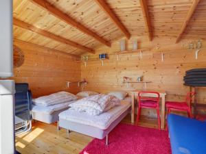 Ένα ή περισσότερα κρεβάτια σε δωμάτιο στο Holiday Home Harthe - 800m from the sea by Interhome