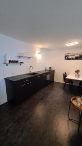 Η κουζίνα ή μικρή κουζίνα στο Exklusives und zentrales Wohnen direkt am Marktplatz Whg2