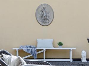 a white table with a laptop on it in a room at Apartment Viivi - 900m from the sea by Interhome in Skagen