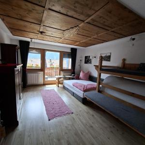 Katil atau katil-katil dalam bilik di Xxl-appartement Moarhof