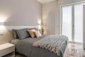 Ένα ή περισσότερα κρεβάτια σε δωμάτιο στο I'M b&b - Zona Aeroporto Internazionale Milano Malpensa +27 φωτογραφίες