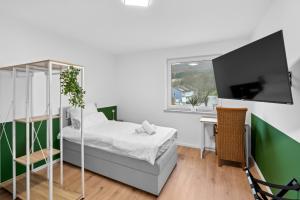 Ένα ή περισσότερα κρεβάτια σε δωμάτιο στο Business Apartment in Oberkochen