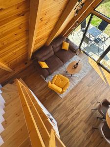 an overhead view of a living room with a couch at Durmitor's Mirror Žabljak in Žabljak +19 photos