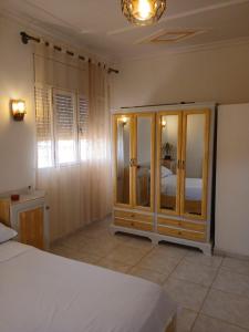 En eller flere senge i et værelse på Kariat arkma