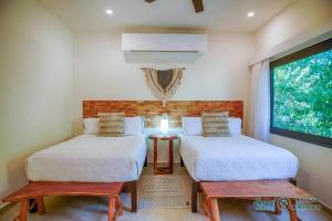 Ένα ή περισσότερα κρεβάτια σε δωμάτιο στο Chic Retreat