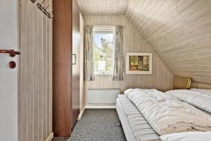 Ένα ή περισσότερα κρεβάτια σε δωμάτιο στο 40758-Ulfborg-Hagevej-201