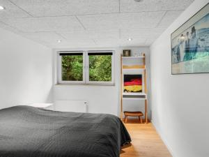 Ένα ή περισσότερα κρεβάτια σε δωμάτιο στο Holiday Home Vicente - 14km to the fjord by Interhome