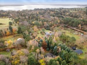 an aerial view of a house in a forest at Holiday Home Ennignup - 600m to the fjord by Interhome in Højslev