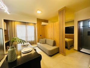 TV a/nebo společenská místnost v ubytování Studio Living, Conforto e estilo próx ao Center Shopping