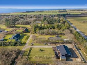 an aerial view of a farm with a house at Holiday Home Elisaveta - 400m to the fjord by Interhome in Vemb