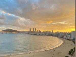 a view of a beach with a city in the background at 광안리 T-OCEAN House in Kwangan-dong