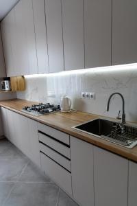 Dapur atau dapur kecil di Апартаменти