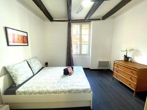 Postel nebo postele na pokoji v ubytování Le Castelviel