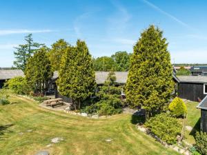 an aerial view of a house with a yard at Holiday Home Meindor - 240m to the fjord by Interhome in Storvorde