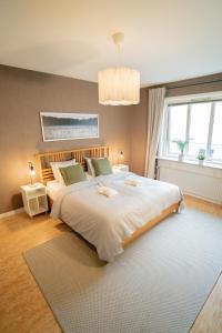 Ένα ή περισσότερα κρεβάτια σε δωμάτιο στο Large City-Centre Apartment