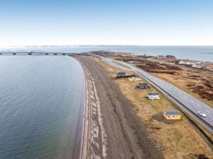 an aerial view of a road next to a body of water at Holiday Home Nyalle - 50m to the inlet by Interhome in Struer