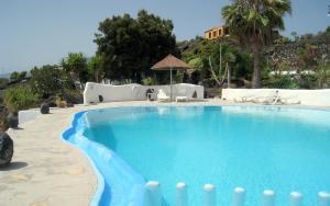 Bazén v ubytování La Hacienda BuenVivir - Apartamentos nebo v jeho okolí