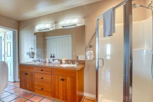 a bathroom with a sink and a shower at Copalis Beach Family Home Close to Sites and Nature in Copalis Beach +23 photos