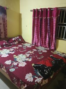 Katil atau katil-katil dalam bilik di Nagamma cottage