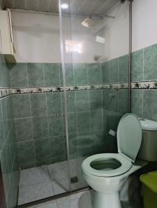 a bathroom with a toilet and a shower at Casa S&J in Mompos +31 photos
