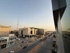 a view of a street in a city with buildings at Blue Rose Garden Hotel فندق بلو روز جاردن العليا in Riyadh