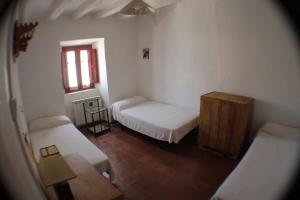 Postel nebo postele na pokoji v ubytování Albergue La Mochila + 1 fotografie