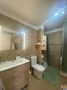 Phòng tắm tại Roca Negra Playa Paraíso Apartment 2-bedrooms