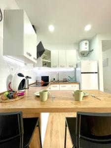 Kuchyň nebo kuchyňský kout v ubytování Apartamento D&L