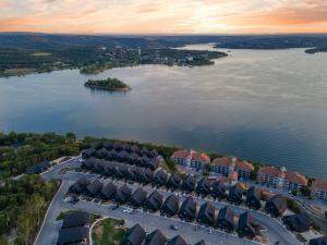 an aerial view of a resort on a lake at Pineapple Shores - Stay for 14 in Hollister