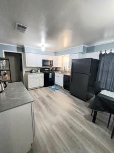 Kuchyň nebo kuchyňský kout v ubytování Stylish Charm