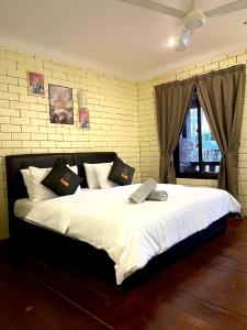 Postel nebo postele na pokoji v ubytování Elysia Resort Langkawi