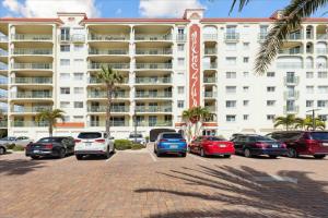 a parking lot in front of a large building at Michelina 406 in Cape Canaveral