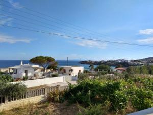 a view of the ocean from a house at Captain George in Liaropá