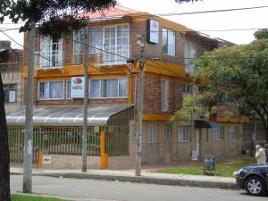 a building on the corner of a street at Casa Santa Isabel in Bogotá