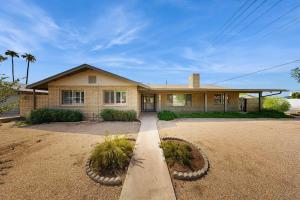 a house with a driveway in front of it at Sunny Delight - MAIN HOUSE ONLY in Glendale