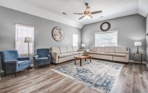 a living room with a couch and two chairs at Crievewood Guesthouse in Bartlett +83 photos