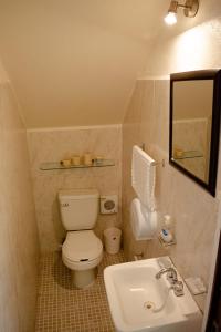Koupelna v ubytování Hermosa casa de 2 pisos con estacionamiento propio + 10 fotografií