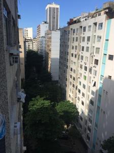 an aerial view of a city with tall buildings at Apartamento Leme - RJ in Rio de Janeiro