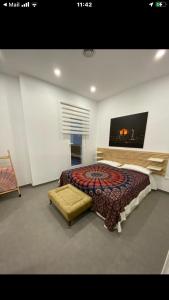 Ένα ή περισσότερα κρεβάτια σε δωμάτιο στο APARTAMENTo MODERNO CENTRO MADRID - ARGÜELLES-PLAZA ESPAÑA