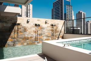 Πισίνα στο ή κοντά στο Suíte Clean Premium By Boss