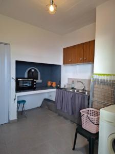 Η κουζίνα ή μικρή κουζίνα στο Varanda Encantada House