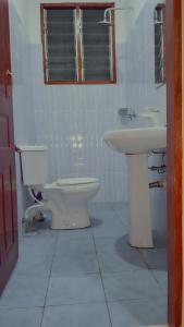 Gallery image of Indian ocean apartments you get the master bedroom with the private bathroom and the host sleeps in the other bedroom you share kitchen anc living room in Mombasa +13 photos