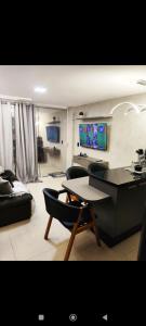 Televisyen dan/atau pusat hiburan di Florença Residence