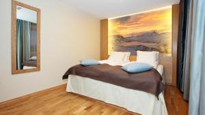 Postel nebo postele na pokoji v ubytování Thon Hotel Surnadal